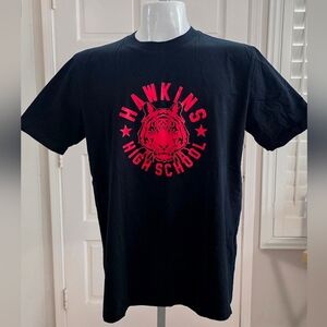 The Nike X Stranger Things Hawkins High School Black Red Tee Shirt men’s LARGE